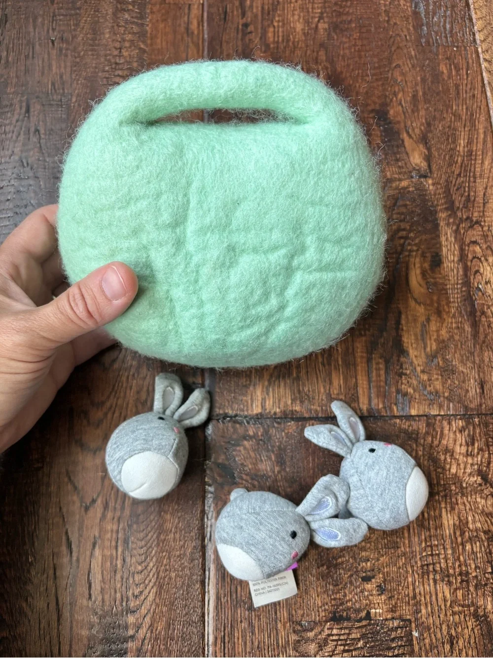 Lovevery bunnies in a felt burrow babbler play kit
